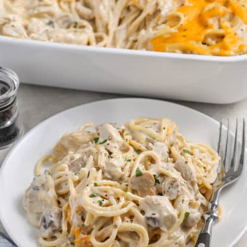 A serving of chicken tetrazzini on a plate with a fork