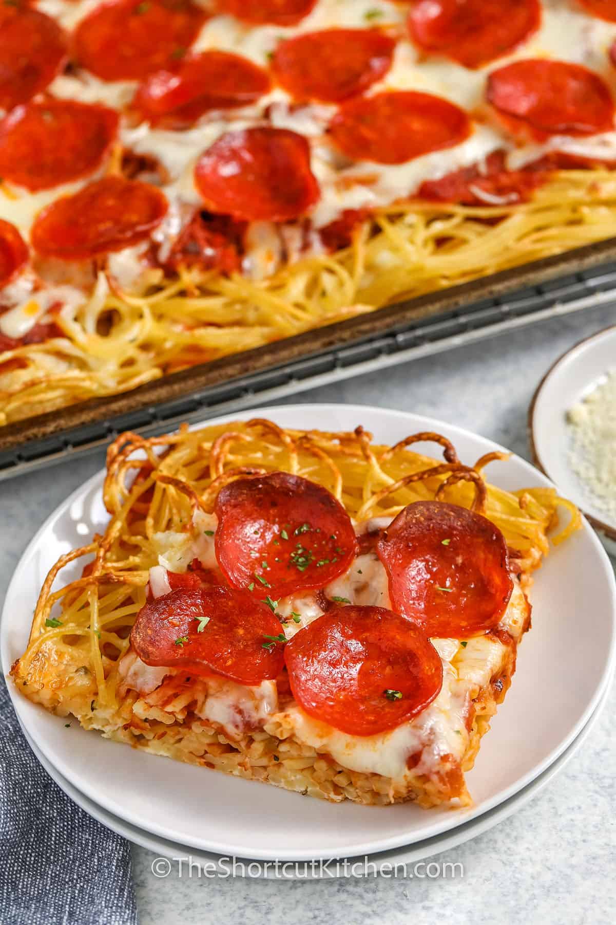 plated Spaghetti Pizza slice