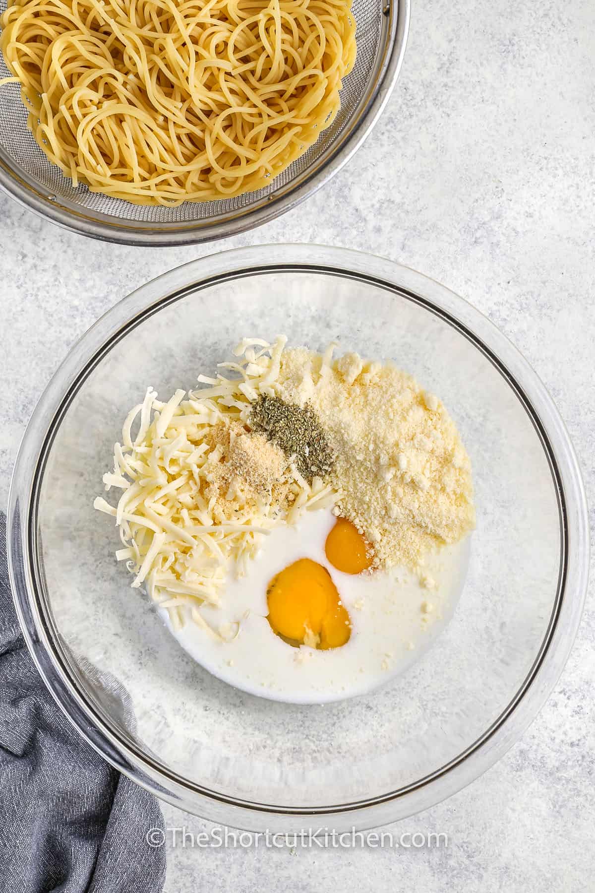 adding ingredients to bowl to make Spaghetti Pizza