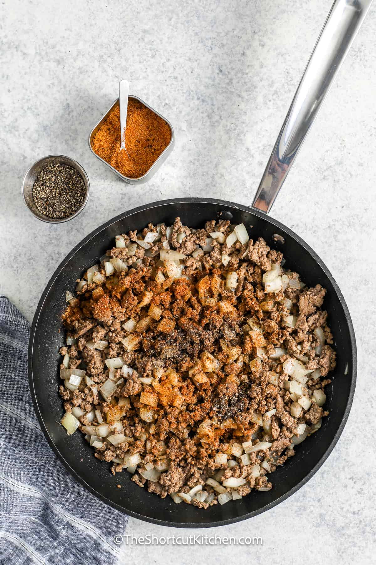 ground beef mixture for Bisquick Cheeseburger Pie being cooked in a skillet