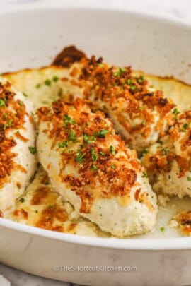 French onion baked chicken topped with fried french onions in a casserole dish