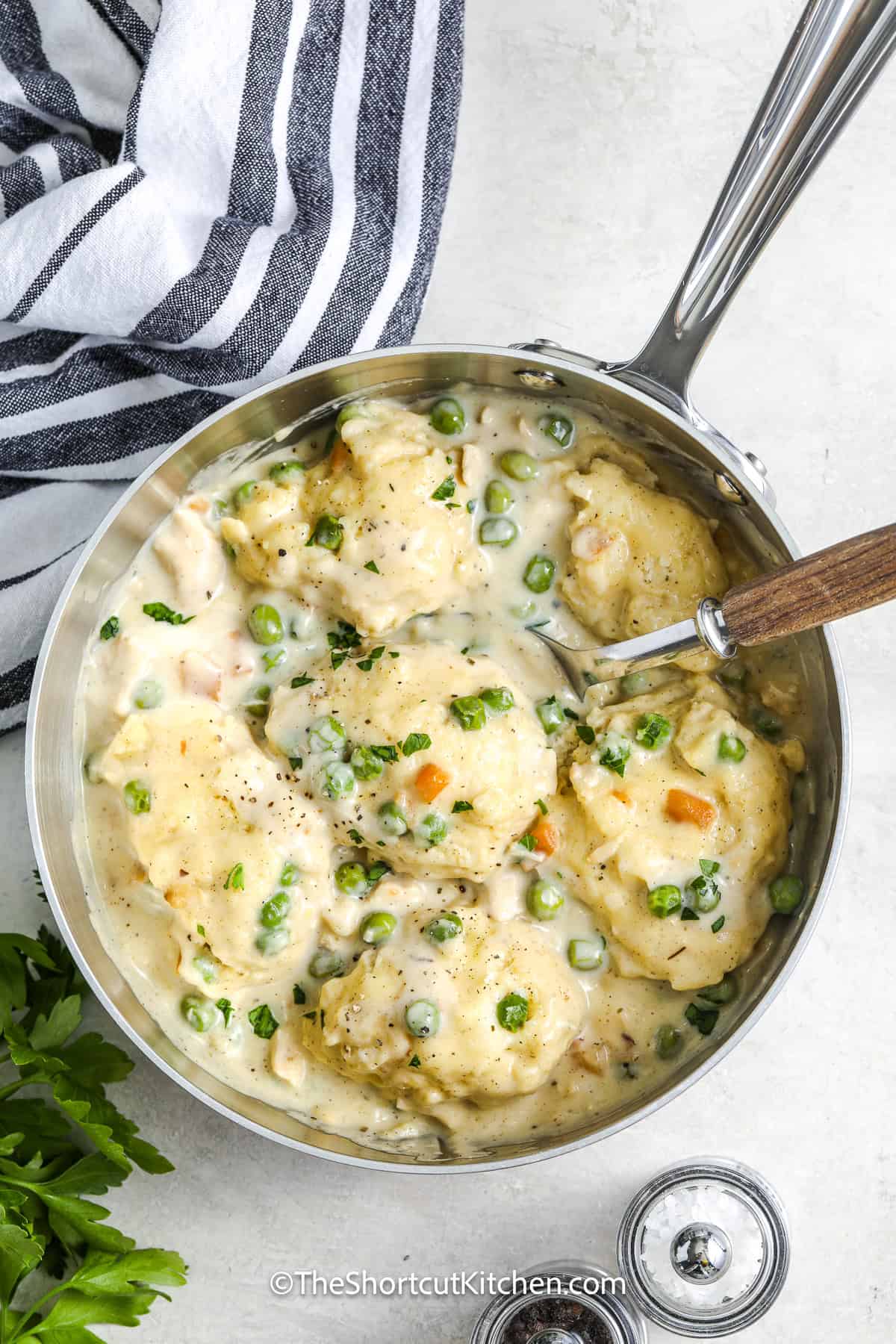 bisquick chicken and dumplings cooked in a sauce pan