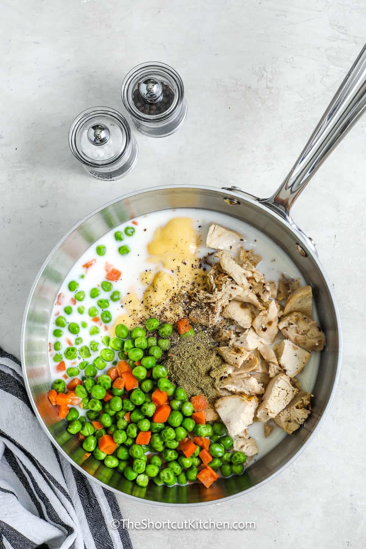 chicken and dumplings ingredients in a pot