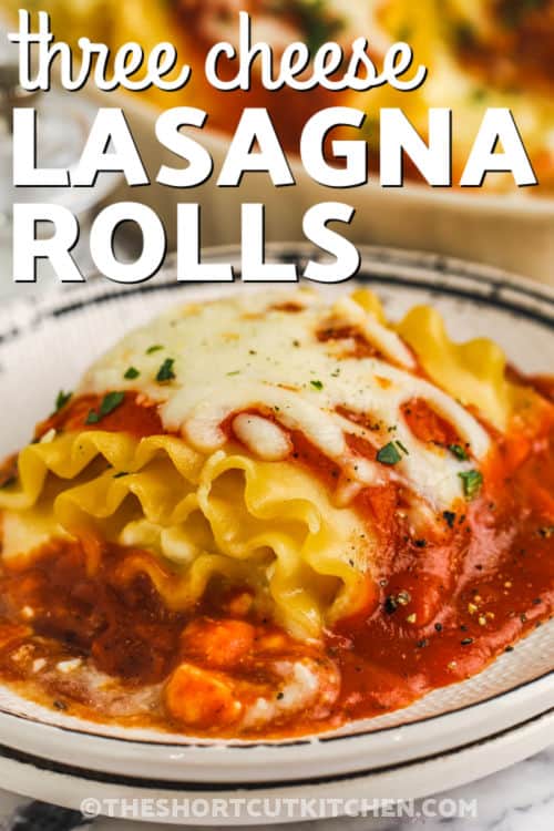 Three Cheese Lasagna Rolls on a plate with sauce and a title