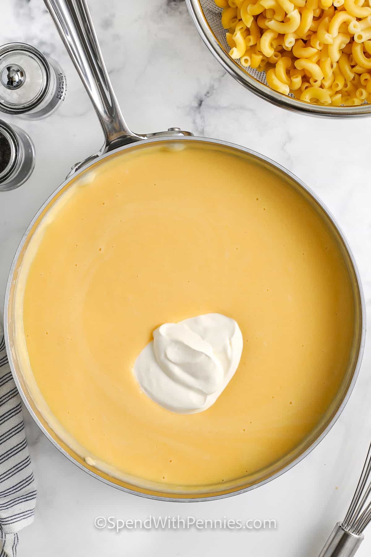 making the cheese sauce for Sour Cream Macaroni and Cheese