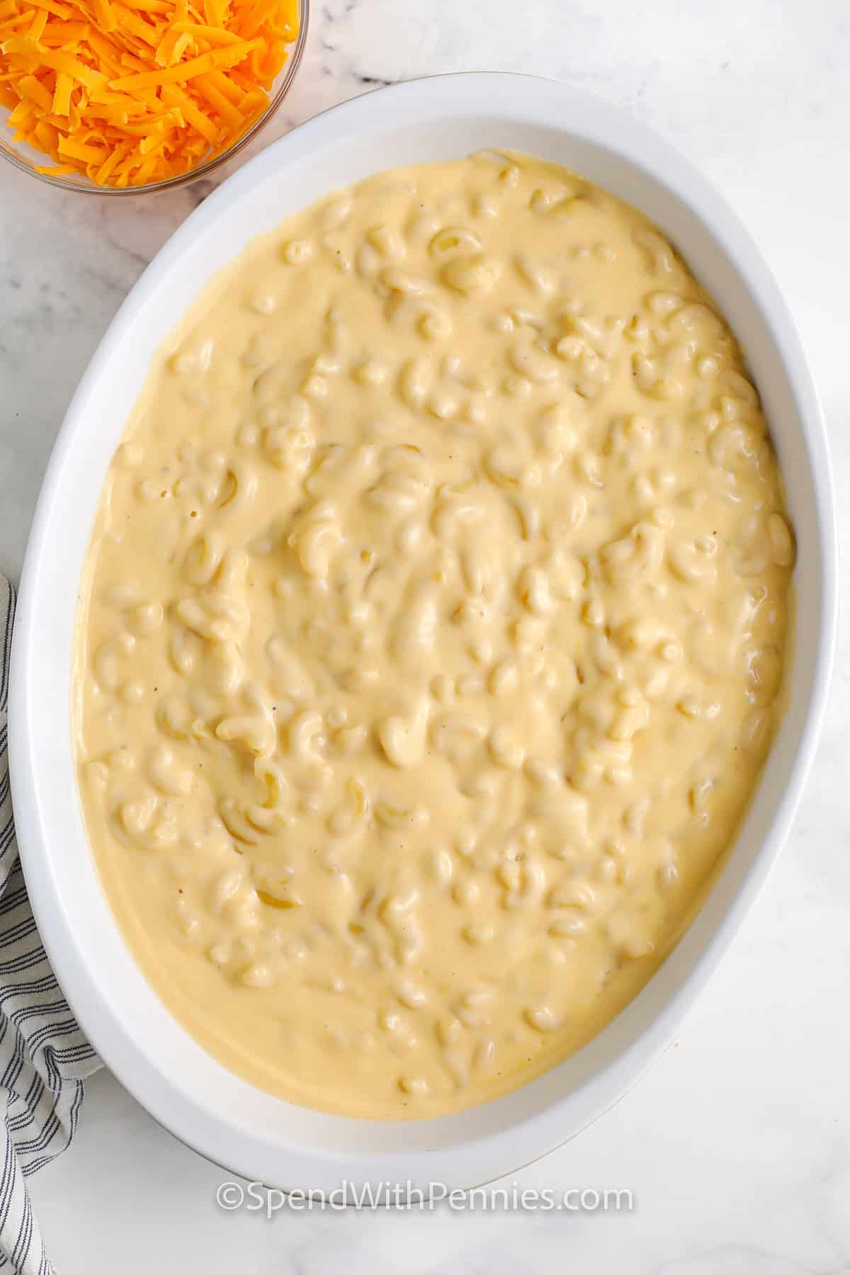 uncooked Sour Cream Macaroni and Cheese in a dish