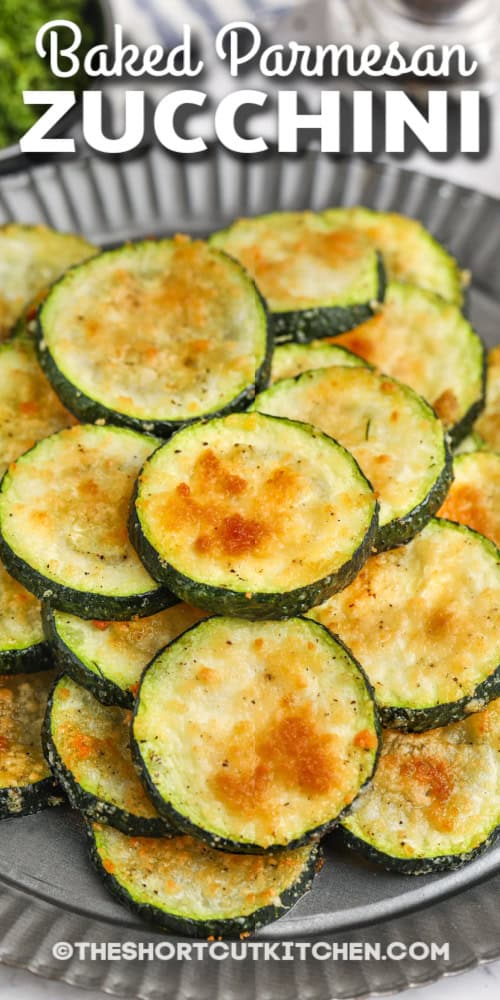 baked parmesan zucchini on a plate with text