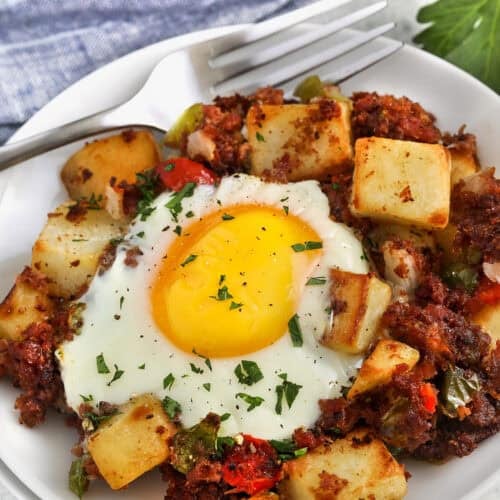 plated Canned Corn Beef Hash with a fork
