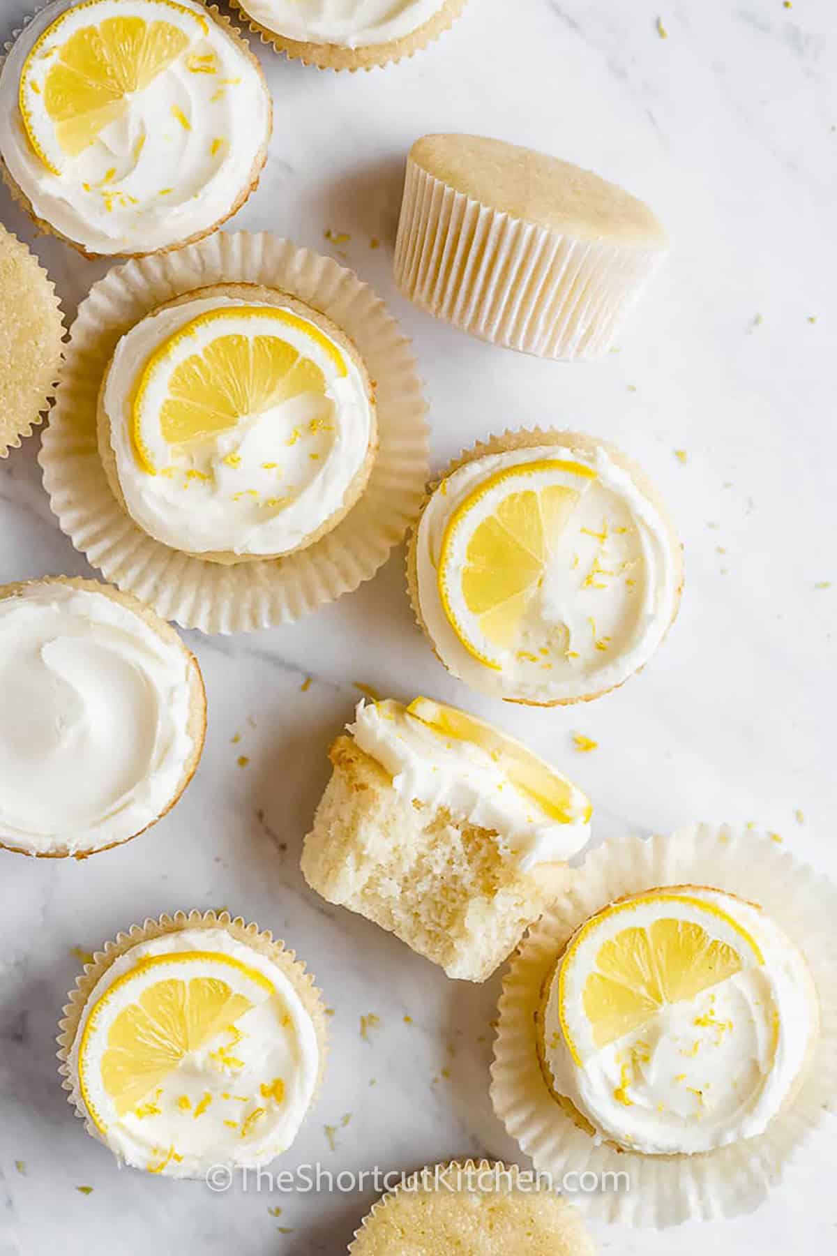 easy Lemon Cupcake Recipe with frosting and lemon slices on top