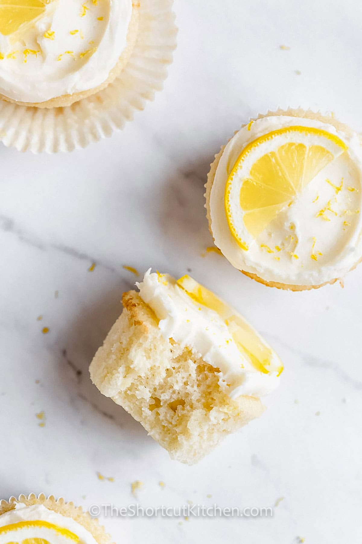 Lemon Cupcake Recipe with a bite taken out of one