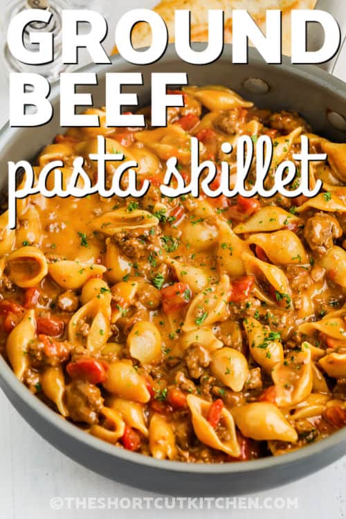 ground beef pasta in a skillet writing