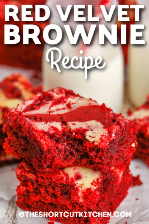 two stacked red velvet brownies with writing