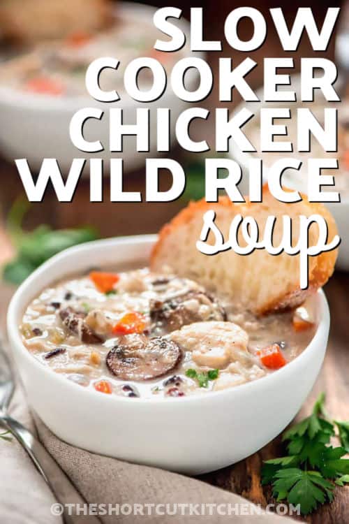 bowl of Slow Cooker Chicken Wild Rice Soup with bread and a title