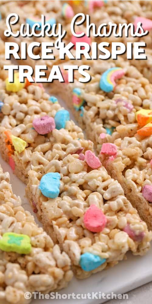 lucky charms rice krispie treats cut into bars and writing