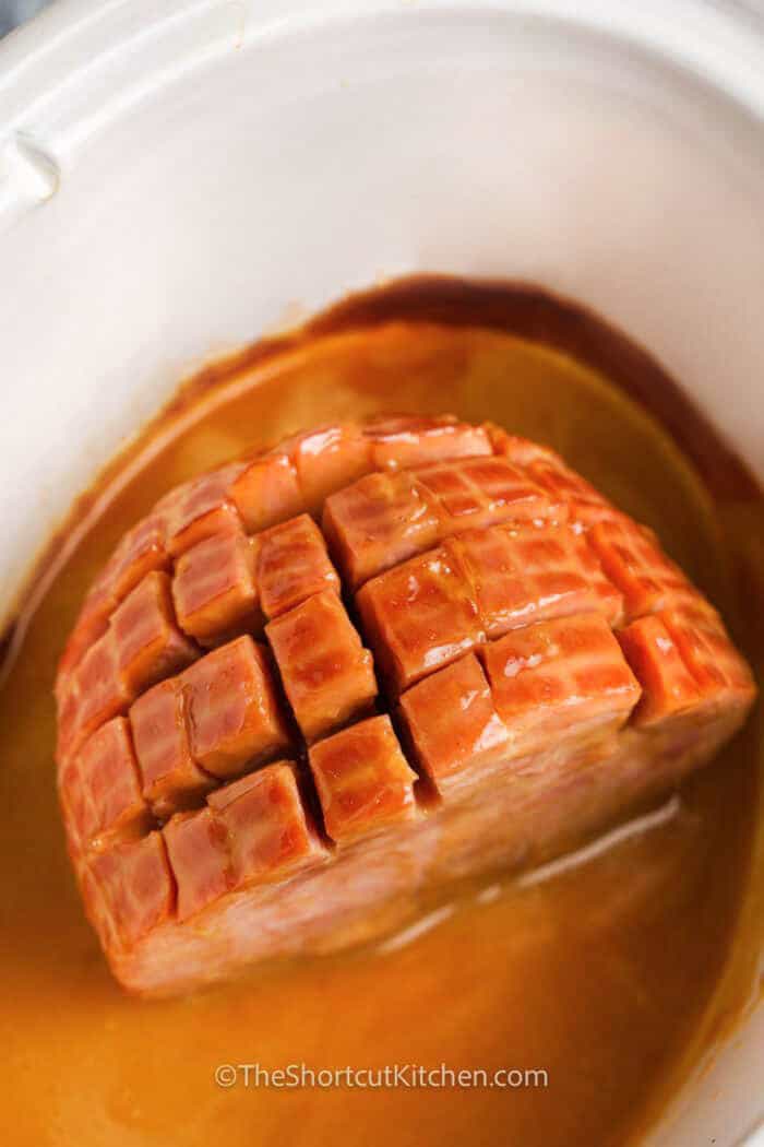 Crockpot Brown Sugar Ham with glaze in the pot