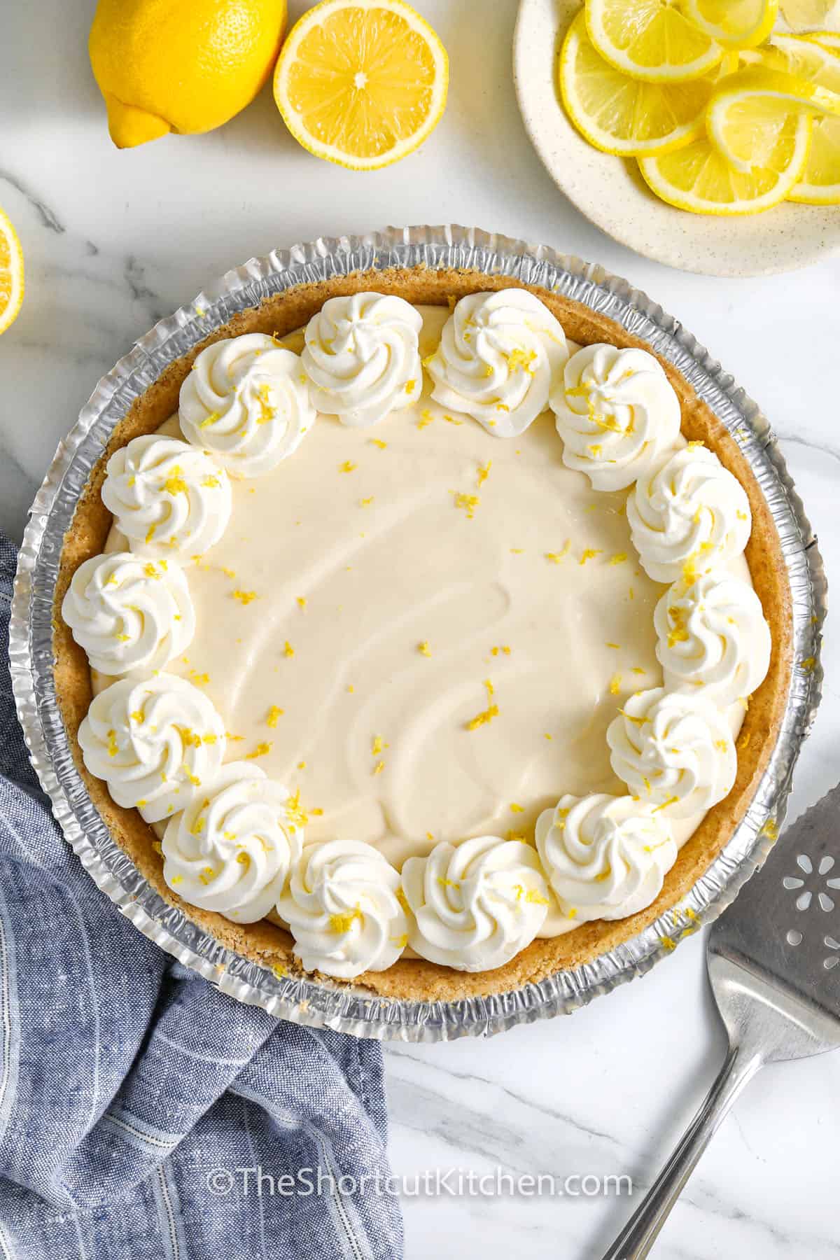 Creamy Lemon Pie Recipe with whipped cream and lemon zest