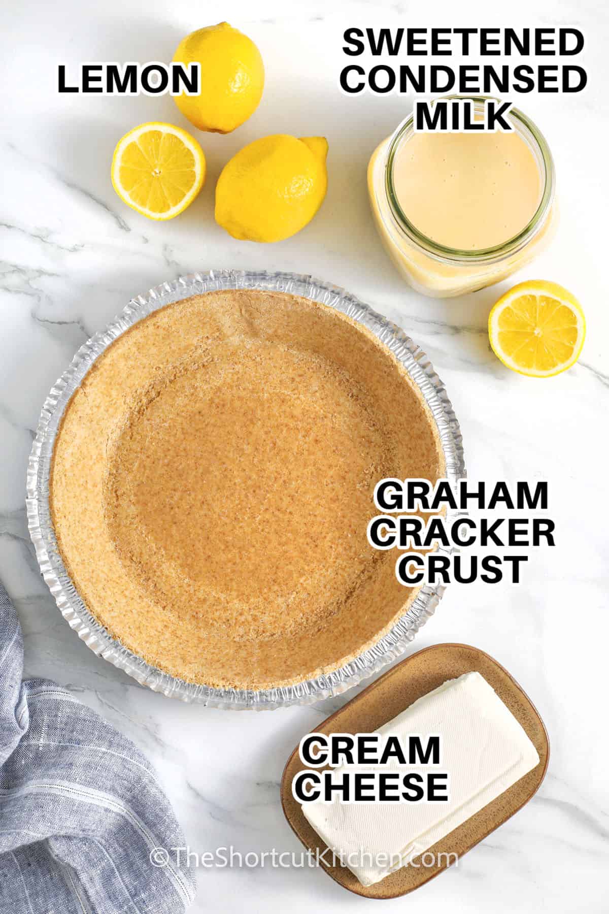 lemon , sweetened condensed milk , graham cracker crust and cream cheese with labels to make Creamy Lemon Pie Recipe