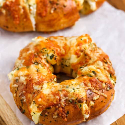 baked Stuffed Bagels on a wooden board
