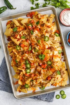 Carnitas Nachos on a sheet pan