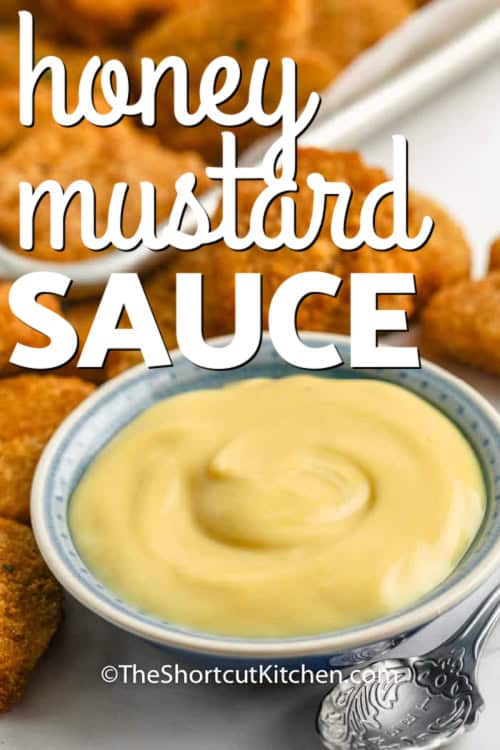 3 Ingredient Honey Mustard in a dish with a spoon and chicken nuggets and a title