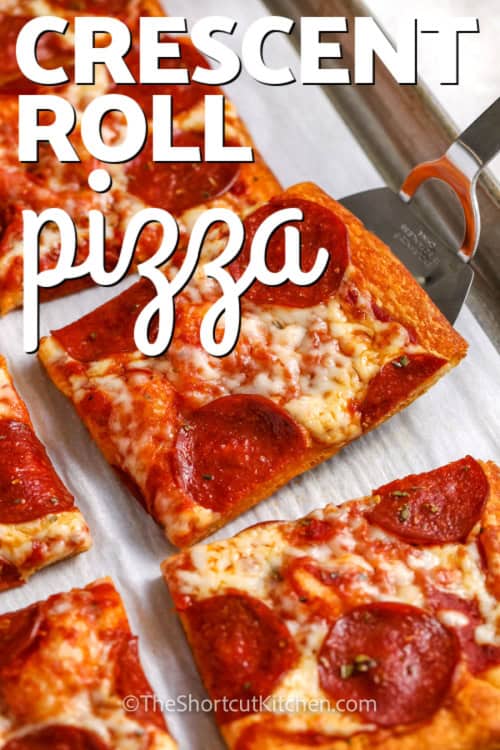 Crescent Roll Pizza cut into pieces with a spatula and a title