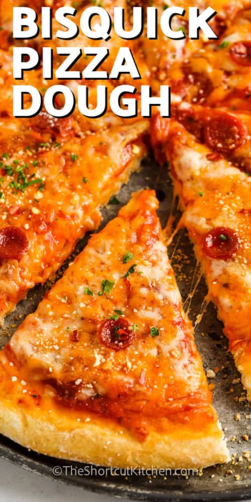 Bisquick Pizza Dough pizza cut into pieces with a title