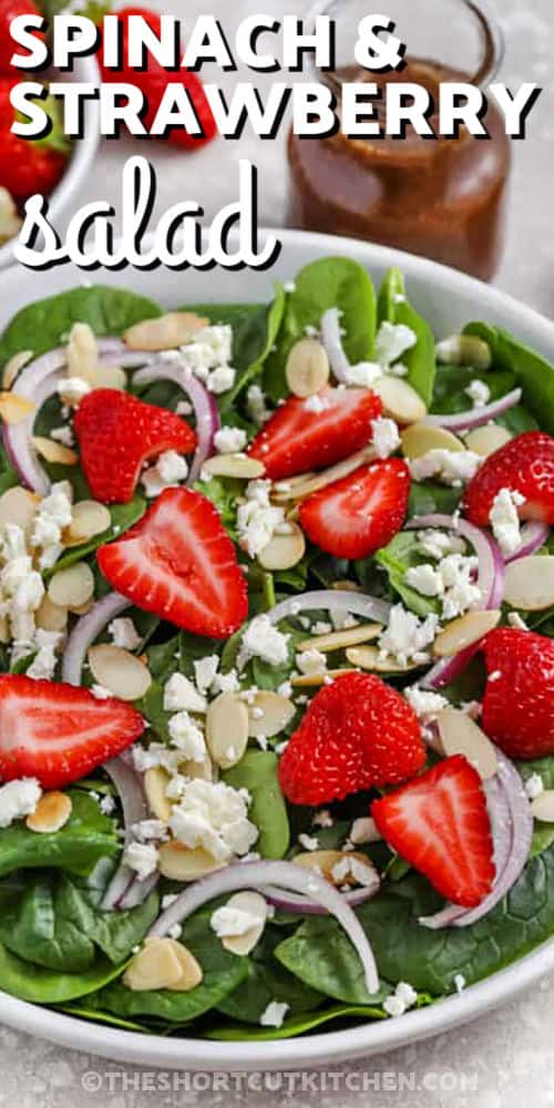 Spinach and Strawberry Salad with feta and writing