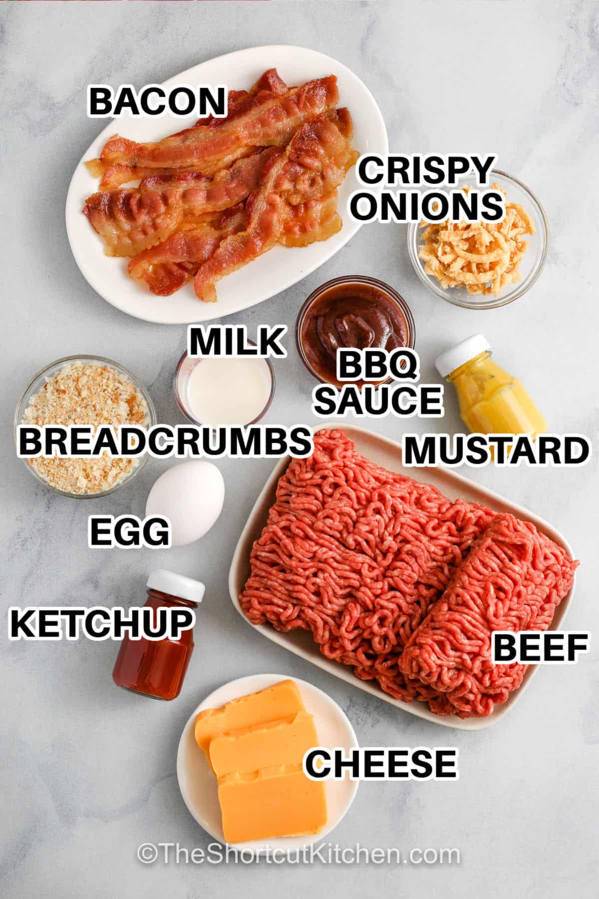 bacon , crispy onions , milk , bbq sauce , mustard, breadcrumbs , egg , ketchup , cheese , beef with labels to make Bacon Cheeseburger Meatloaf