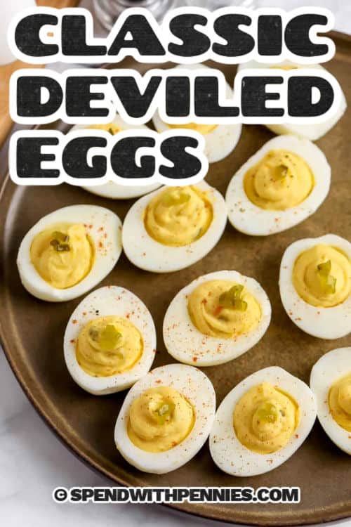 This classic deviled eggs recipe delivers the creamy tangy bite readers want from a traditional egg appetizer. Made with hard-boiled eggs, mayo, mustard, relish, and paprika, it is a quick and easy deviled eggs recipe for chilled serving. Pin it for Easter appetizers, summer potlucks, family dinners, and easy hosting when you want reliable results from simple ingredients. #theshortcutkitchen seasoned Classic Deviled Eggs on a plate