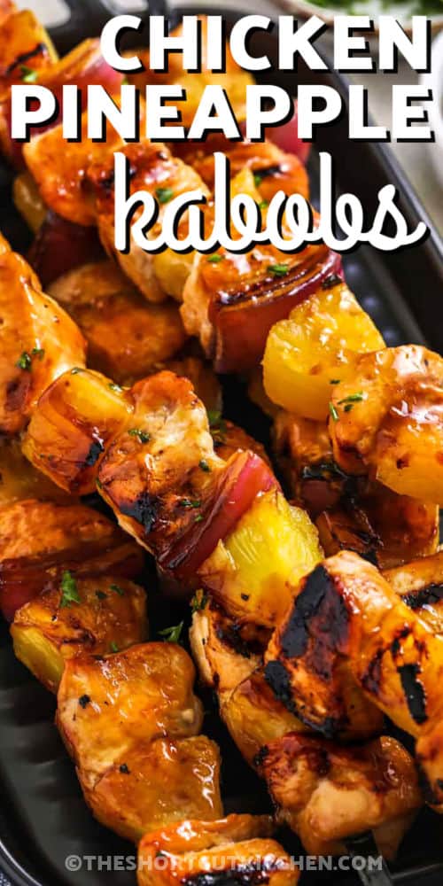 close up of Chicken Pineapple Kabobs with a title