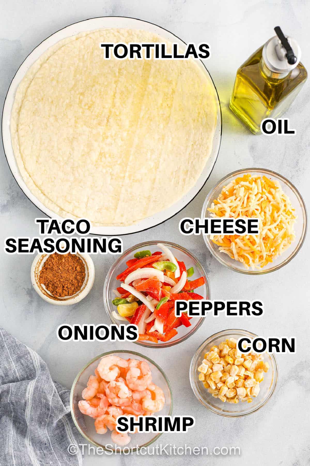 tortillas , taco seasoning , oil , cheese , peppers , onions , corn , shrimp with labels to make Shrimp Quesadillas