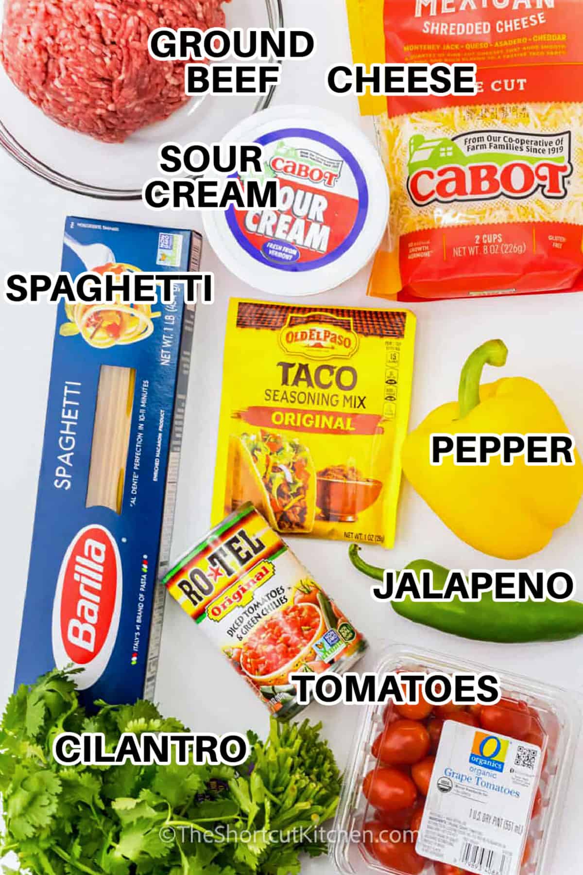 ground beef , sour cream , cheese , spaghetti , taco seasoning , diced tomatoes , cilantro, jalapeño , grape tomatoes , pepper with labels to make Taco Spaghetti Recipe