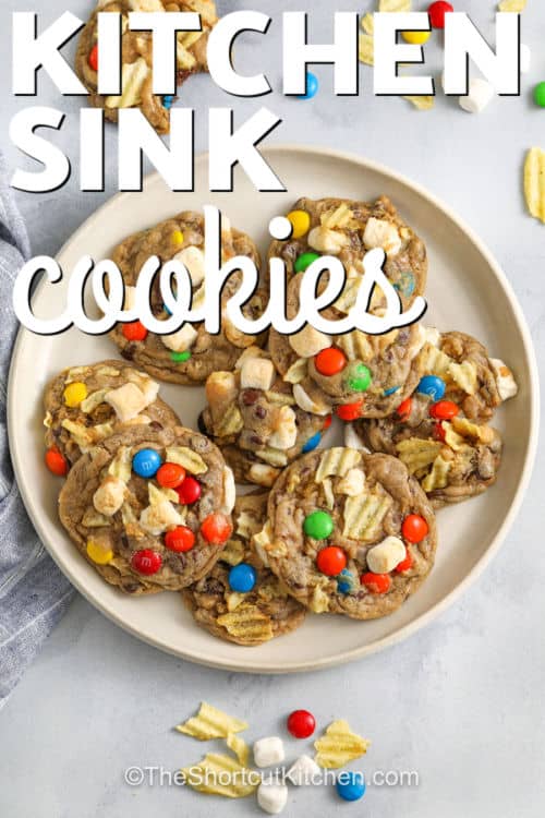 chewy Kitchen Sink Cookies on a plate with a title
