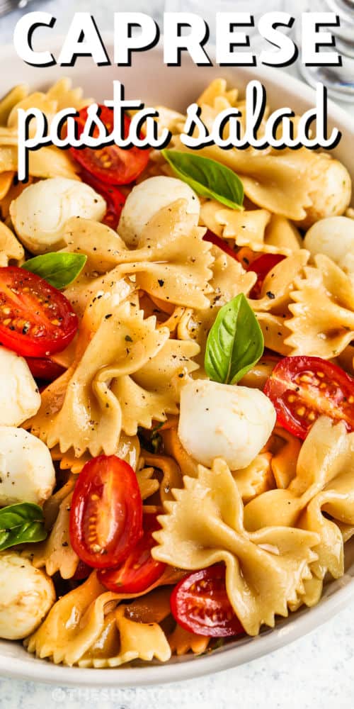 close up of plated Caprese Pasta Salad with a title