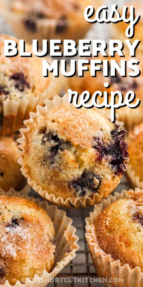 Easy Blueberry Muffins Recipe on a cooling rack with writing