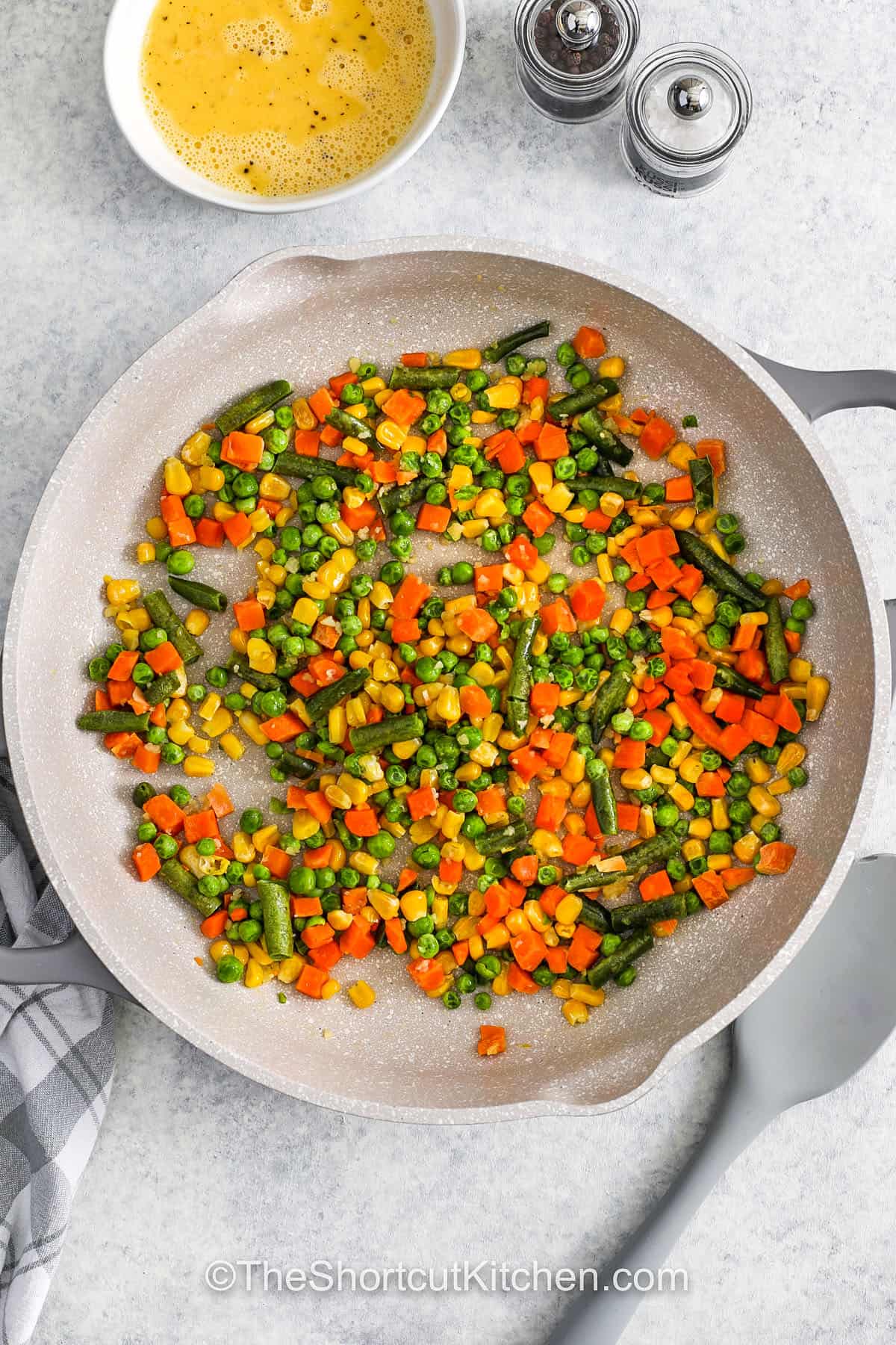 cooked vegetables in a pot to make Shrimp Fried Rice
