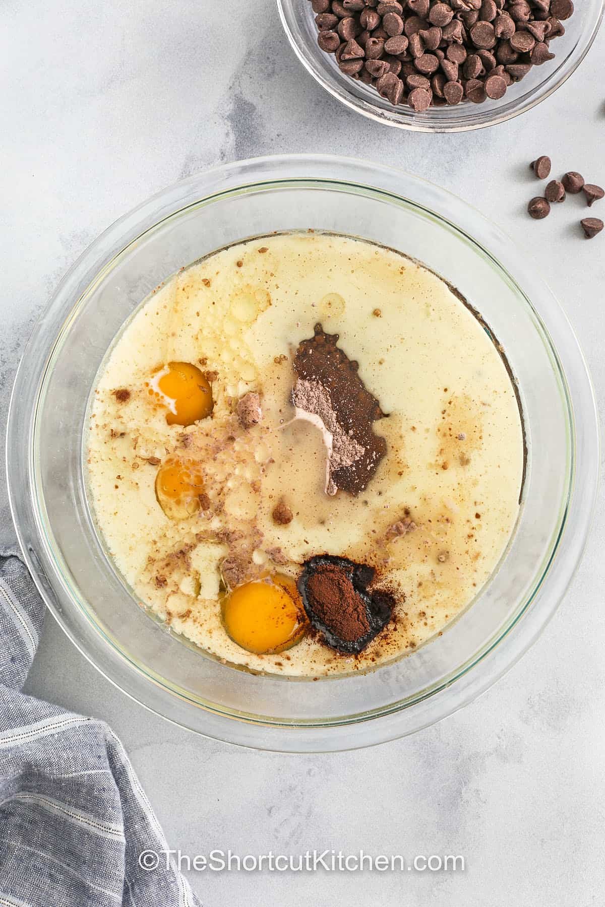 adding ingredients together in bowl to make batter for Crockpot Lava Cake