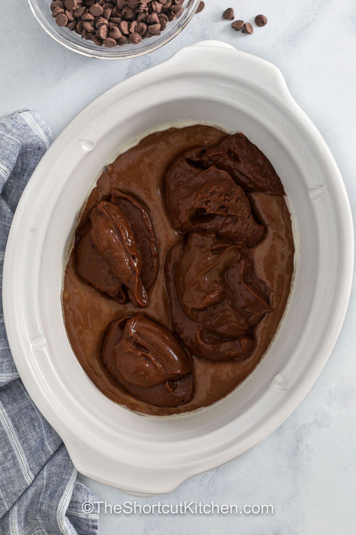 adding chocolate mix to crockpot to make Crockpot Lava Cake