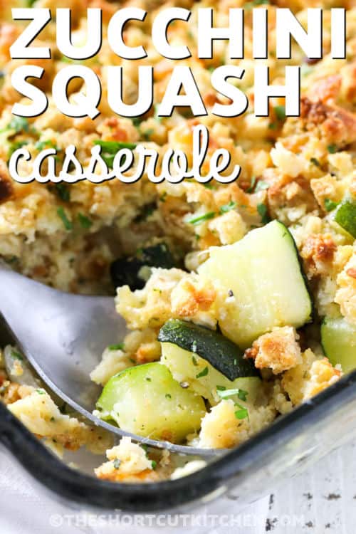 taking a spoonfull of Zucchini Squash Casserole out of the dish with a title