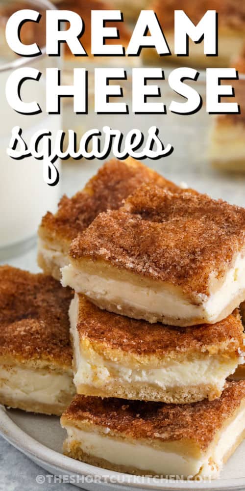 close up of Cream Cheese Squares on a plate with writing