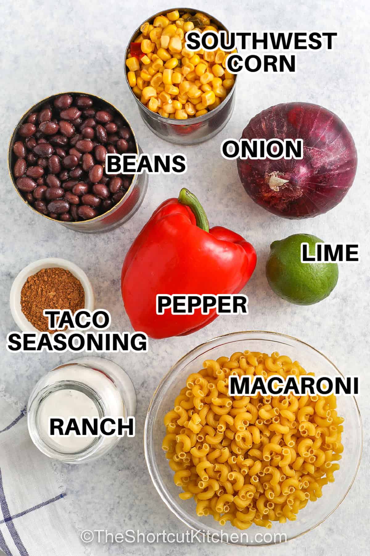southwest corn , beans , onion , lime , pepper , taco seasoning , ranch dressing , macaroni with labels to make Southwest Pasta Salad