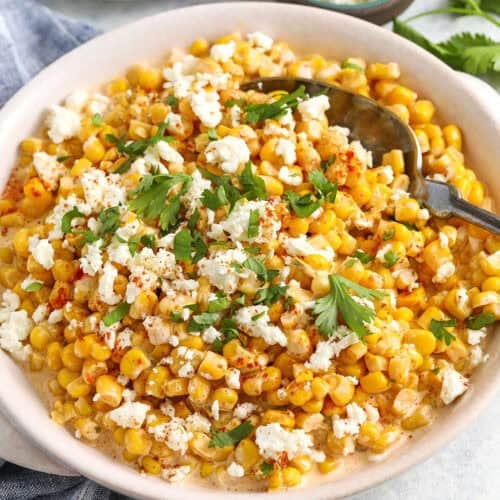 Mexican Corn Salad With Canned Corn in a bowl with a spoon