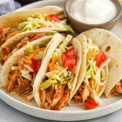 Rotisserie Chicken Tacos with sour cream on the side