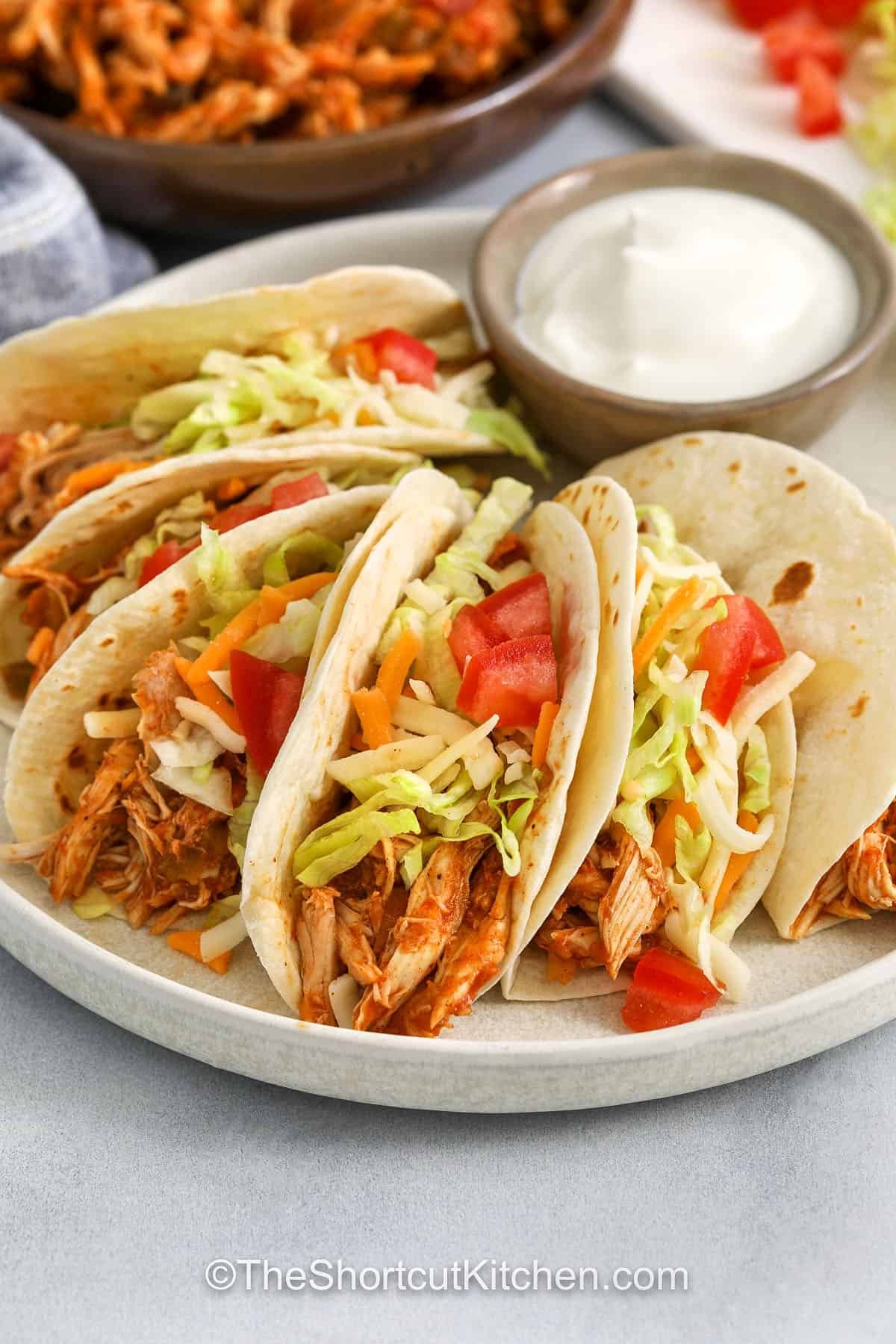 Rotisserie Chicken Tacos with sour cream on the side
