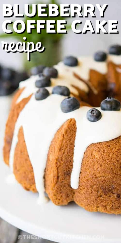 Blueberry Coffee Cake Recipe with icing and blueberries on top and writing