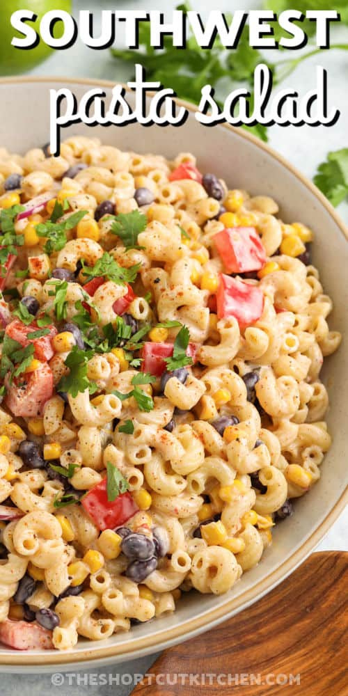 close up of creamy Southwest Pasta Salad in a bowl with a title