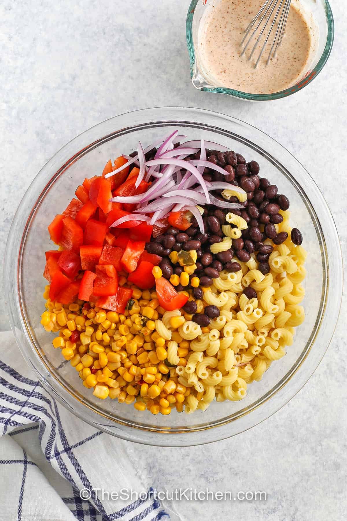 ingredients in bowl to make Southwest Pasta Salad