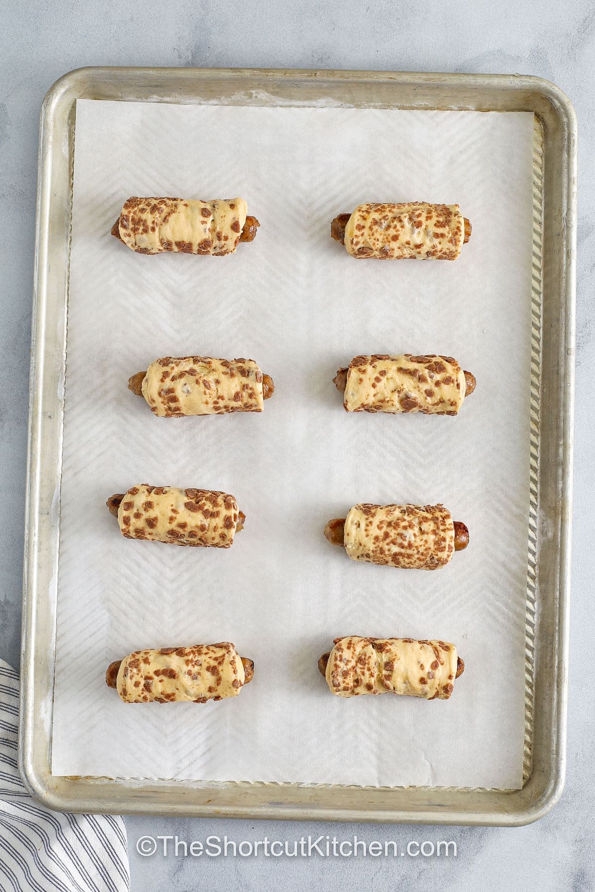 Breakfast Pigs in a Blanket on a sheet pan before cooking