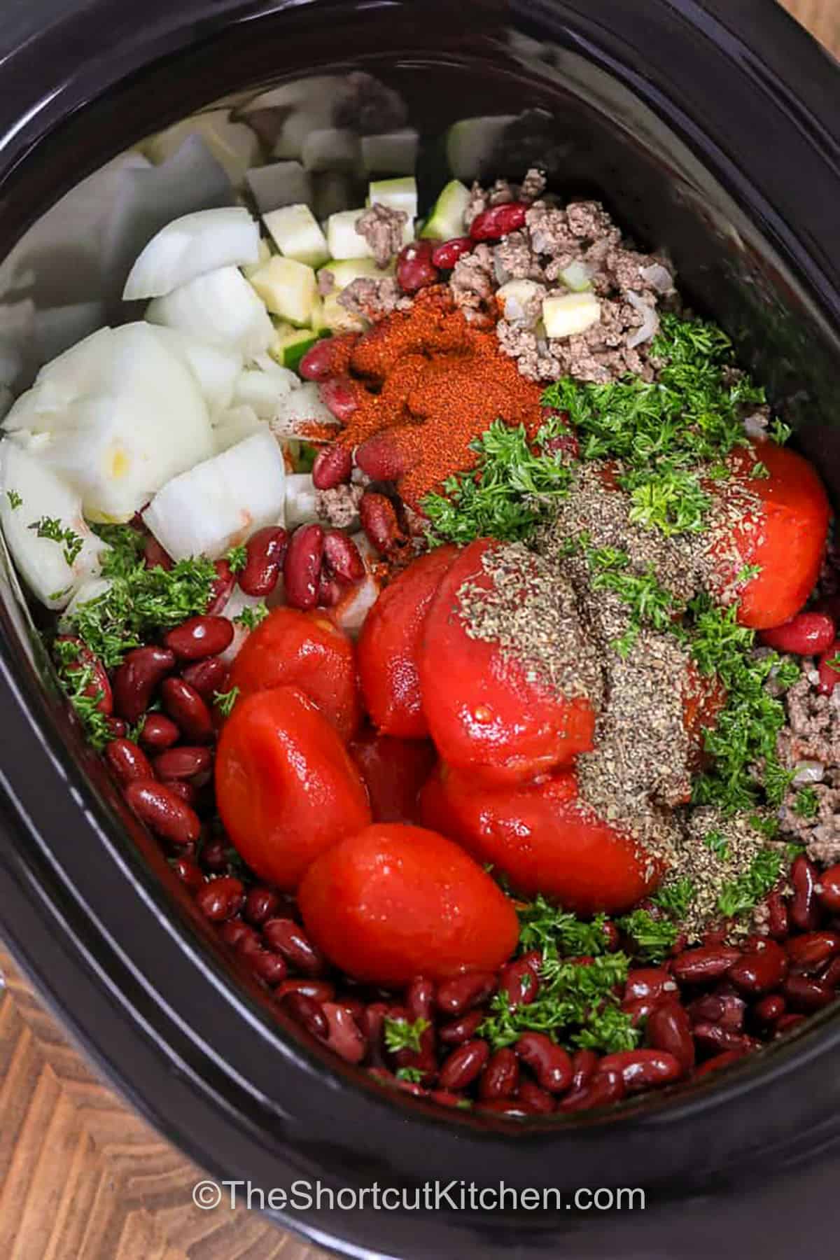 ingredients in a slow cooker to make Easy Slow Cooker Chili