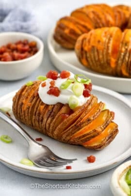 Hasselback Potatoes Recipe made with sour cream , bacon and green onions
